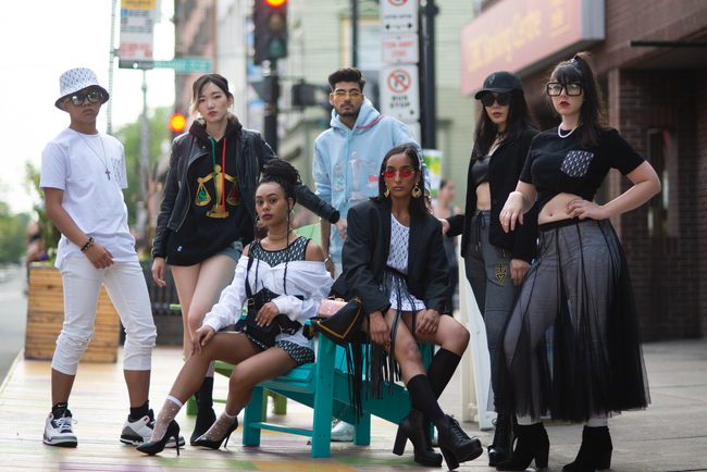 A group of people wearing fashionable clothing