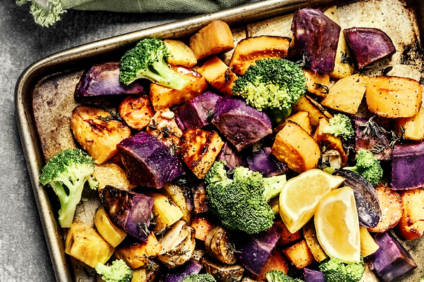 Roasted vegetables on baking sheet